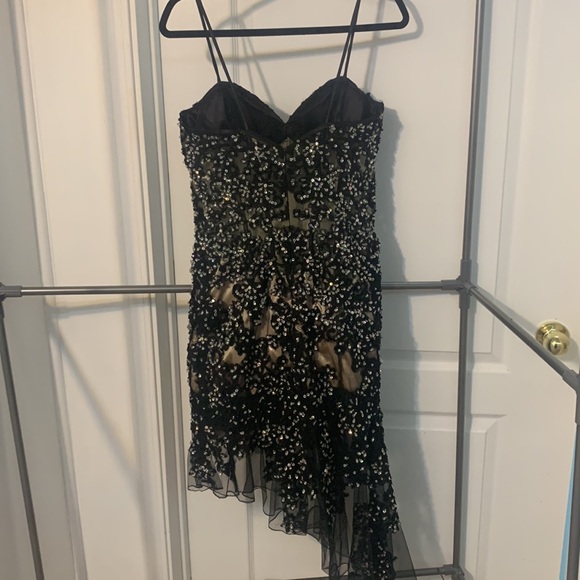 Black Lace Asymmetrical Gem Covered Dress with Nude Underlay - Picture 7 of 8